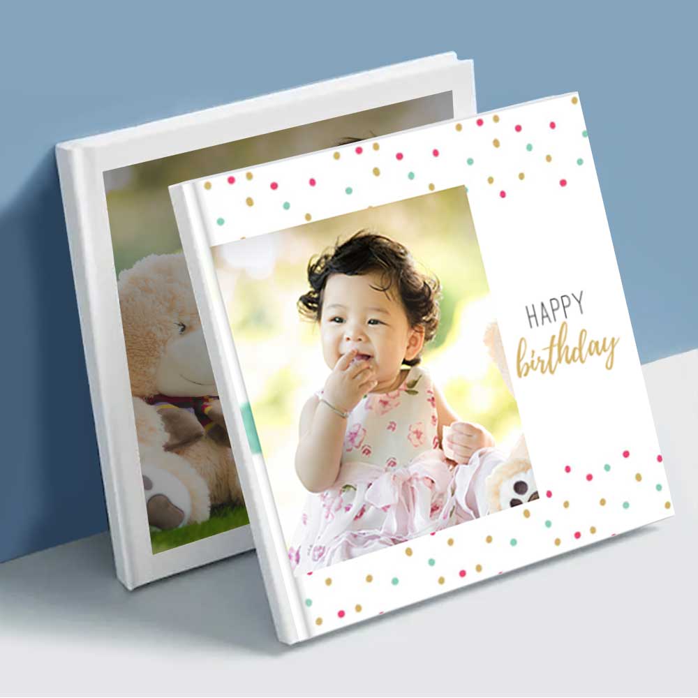 Baby's photo album with birthday theme, a delightful baby shower gift idea