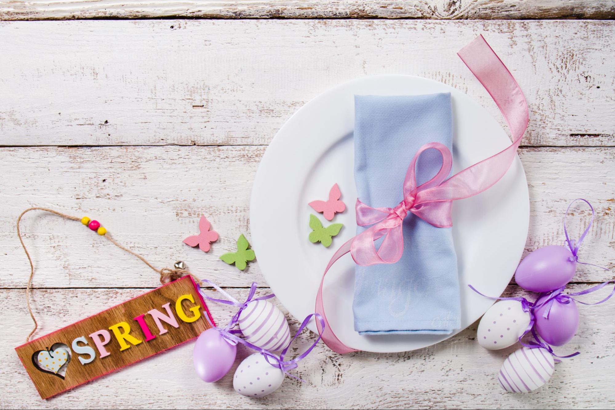 -Spring-themed table setting with burp cloth, ideal for baby shower gift ideas