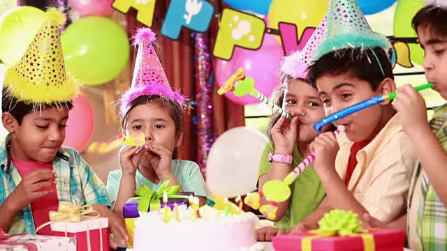 Children playing themed birthday party games
