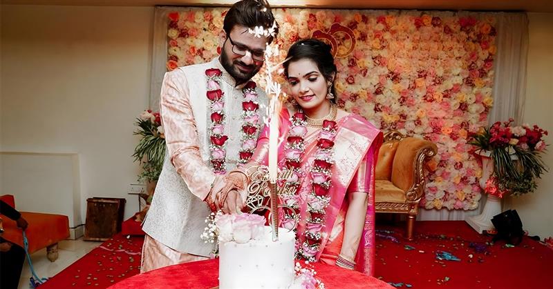 cake cutting wedding couple pose reception celebration moment