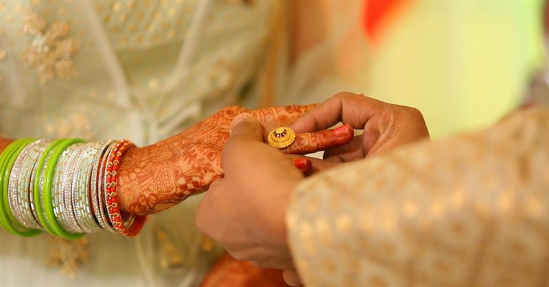 wedding ring close up couple hands romantic wedding photography