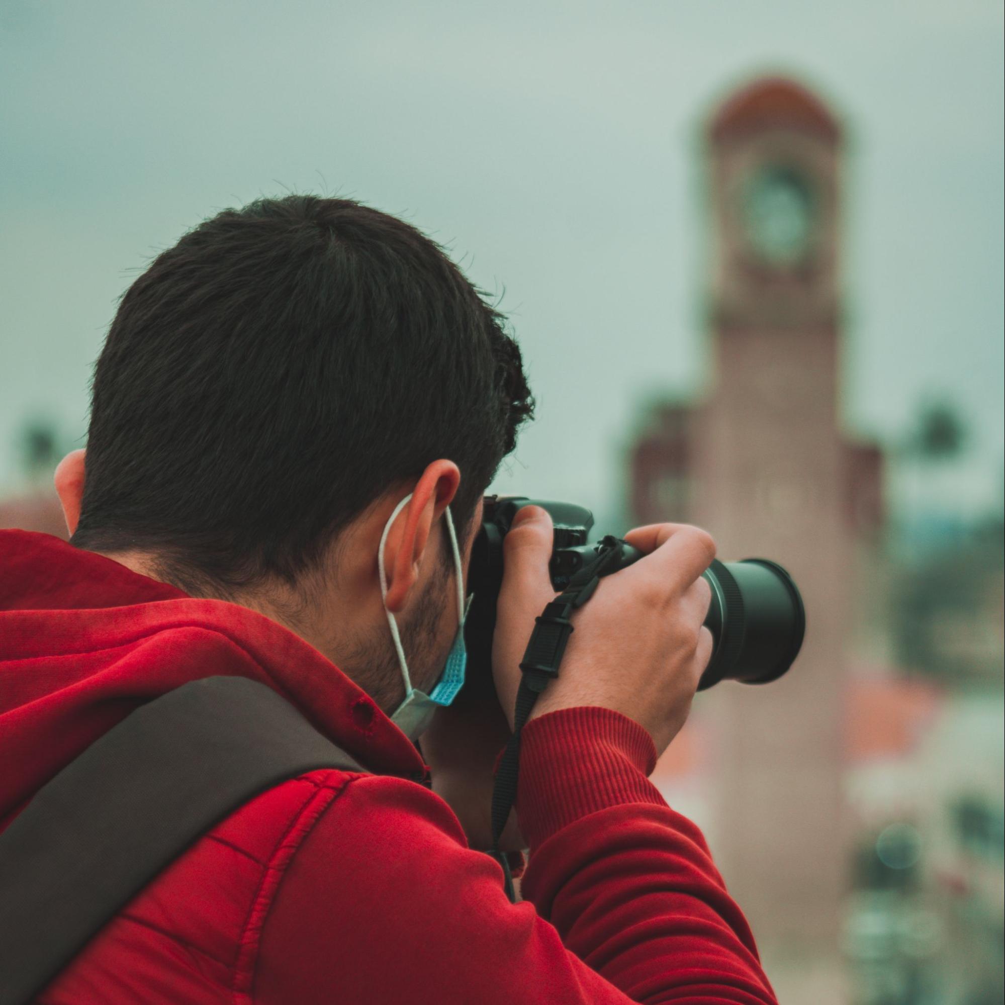 Photographer give direction on photoshoot