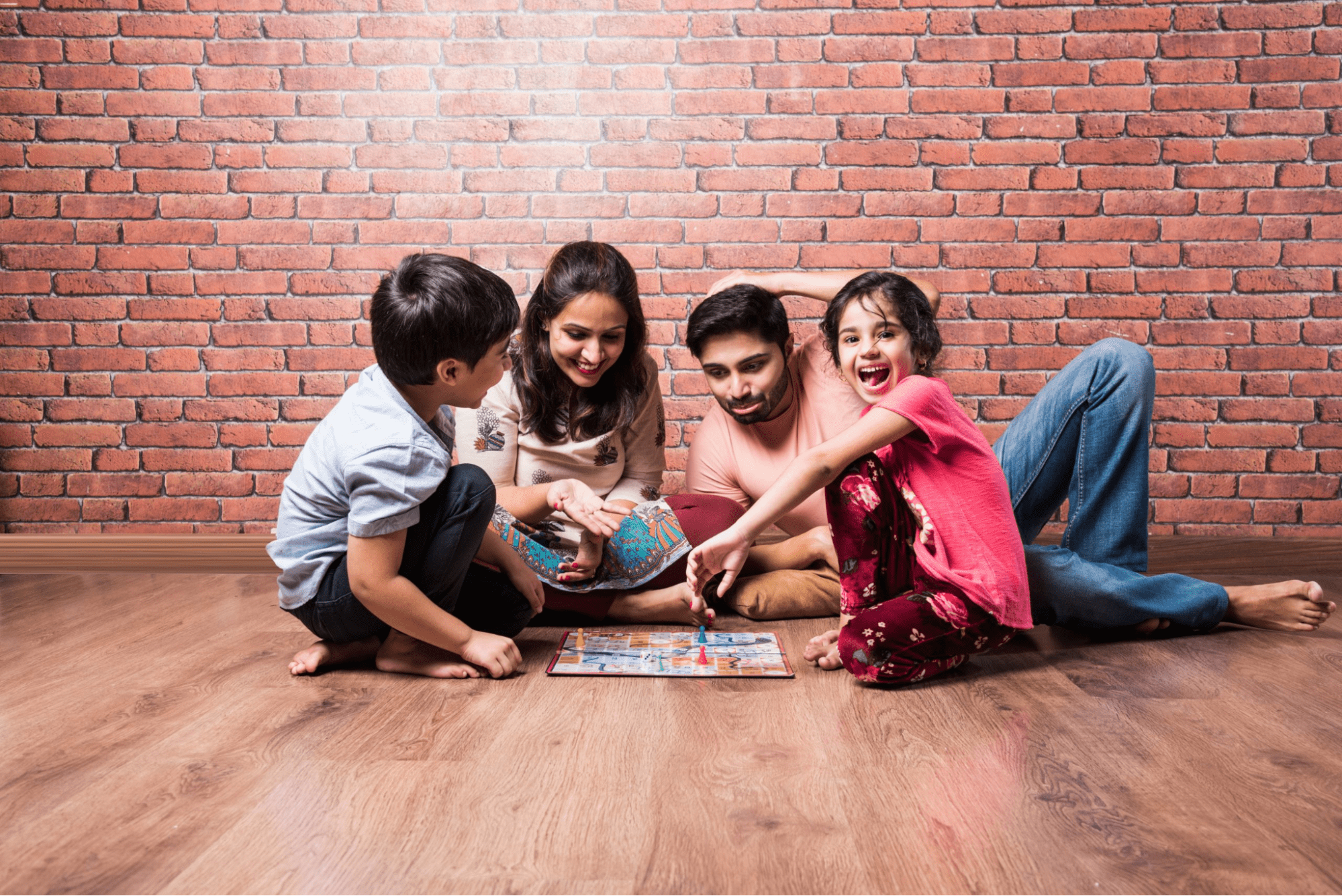  Family playing Ludo