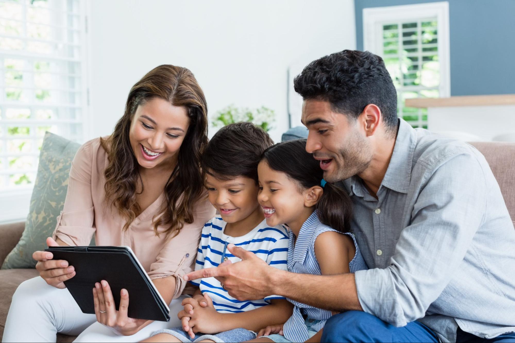 Parent and child designing a custom storybook using online tools