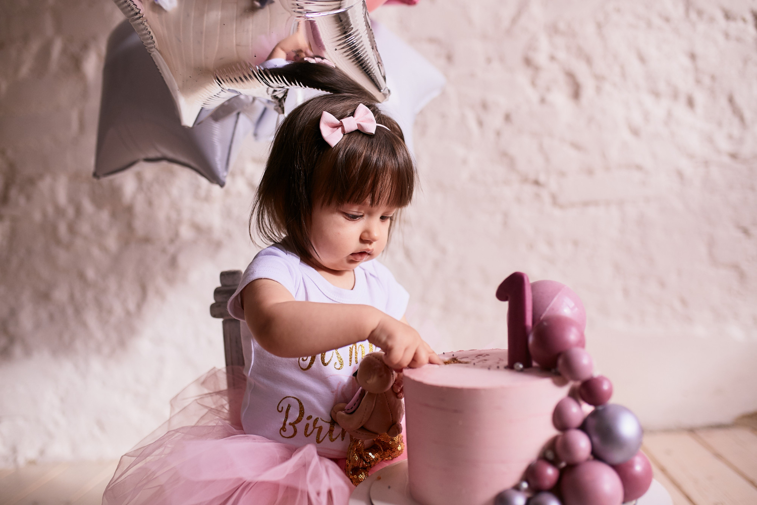 Joyful indulgence: Happy 6-Month Baby's Cake Smash Photoshoot