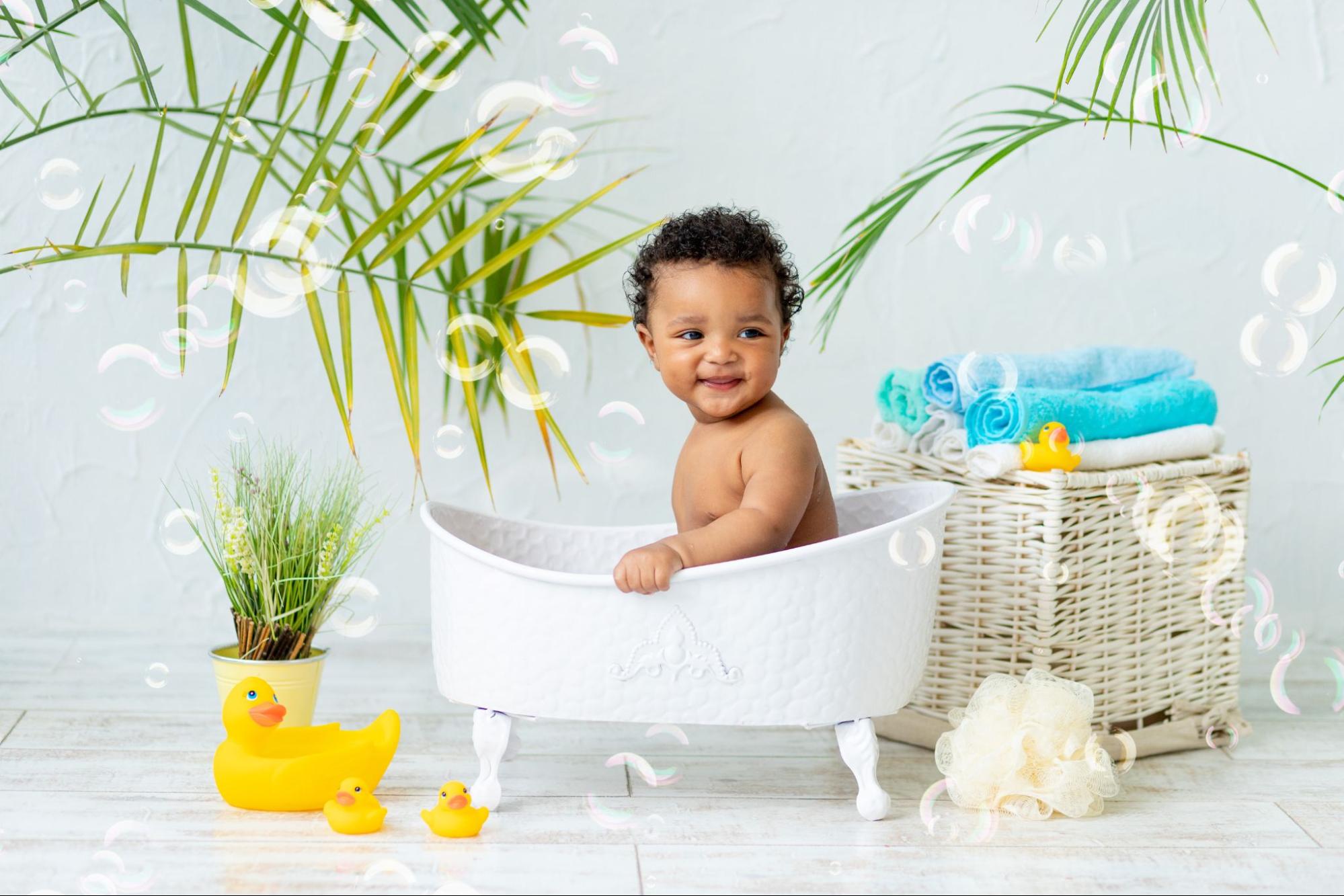 Bathtime bliss: Cute 6-Month Baby's Playful At-Home Photoshoot