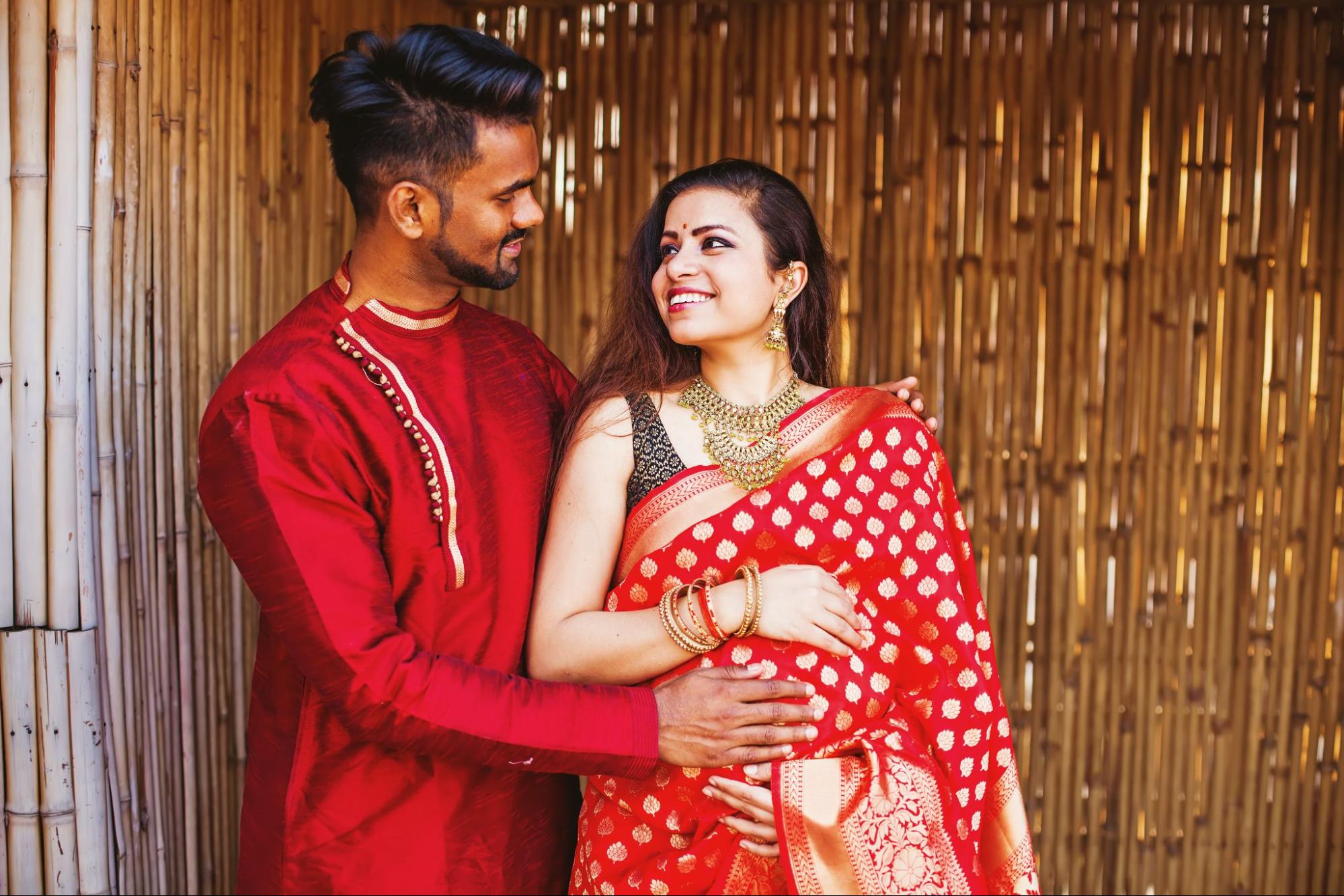 Love and anticipation: Couple pose at baby shower, celebrating the journey of parenthood.