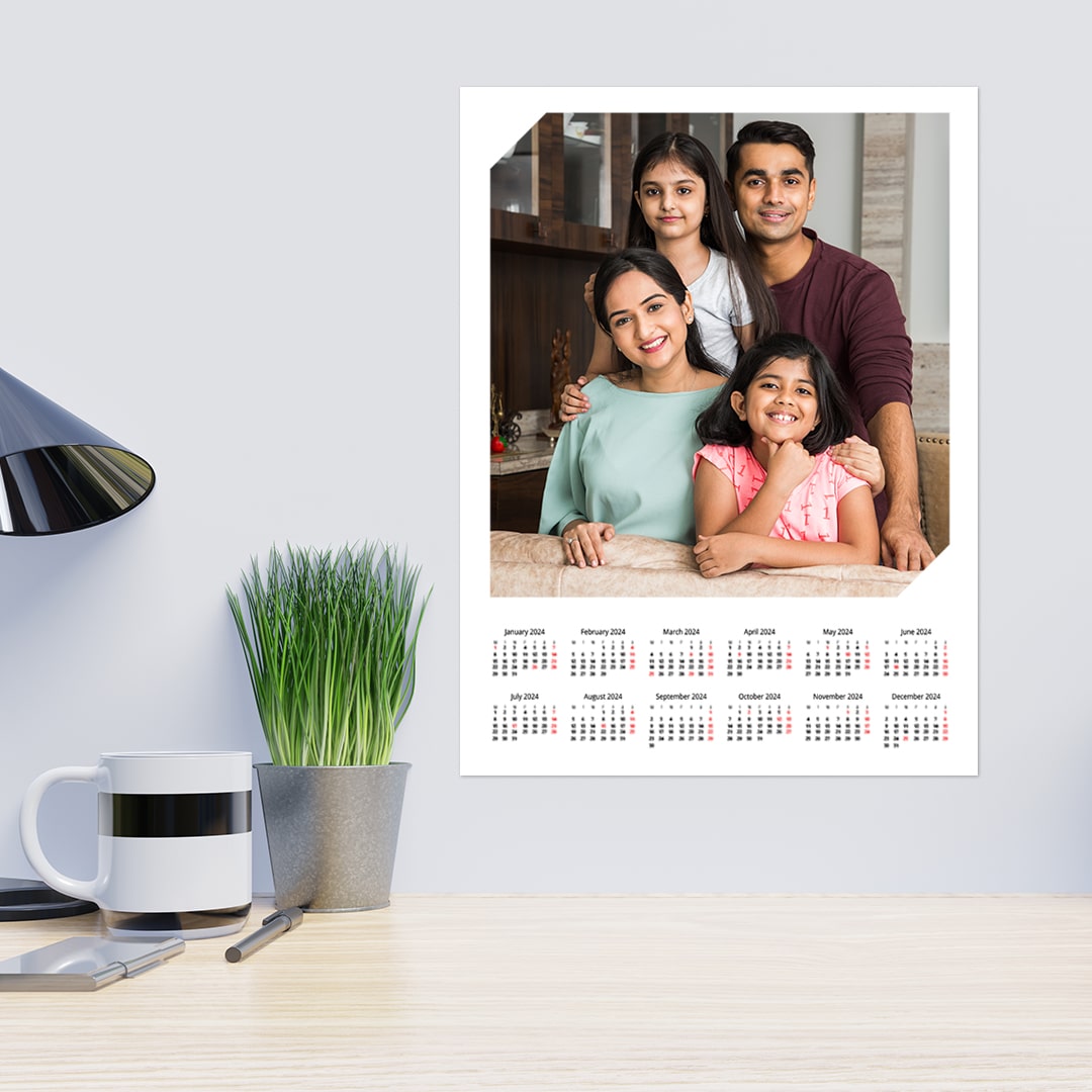 Fitness Challenges and Milestone Tracking depicted by a family photo on a calendar with a desk lamp