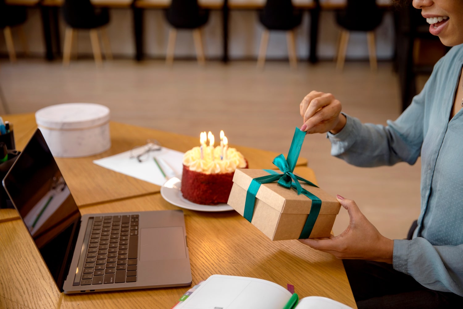 Office birthday celebration with a gift box