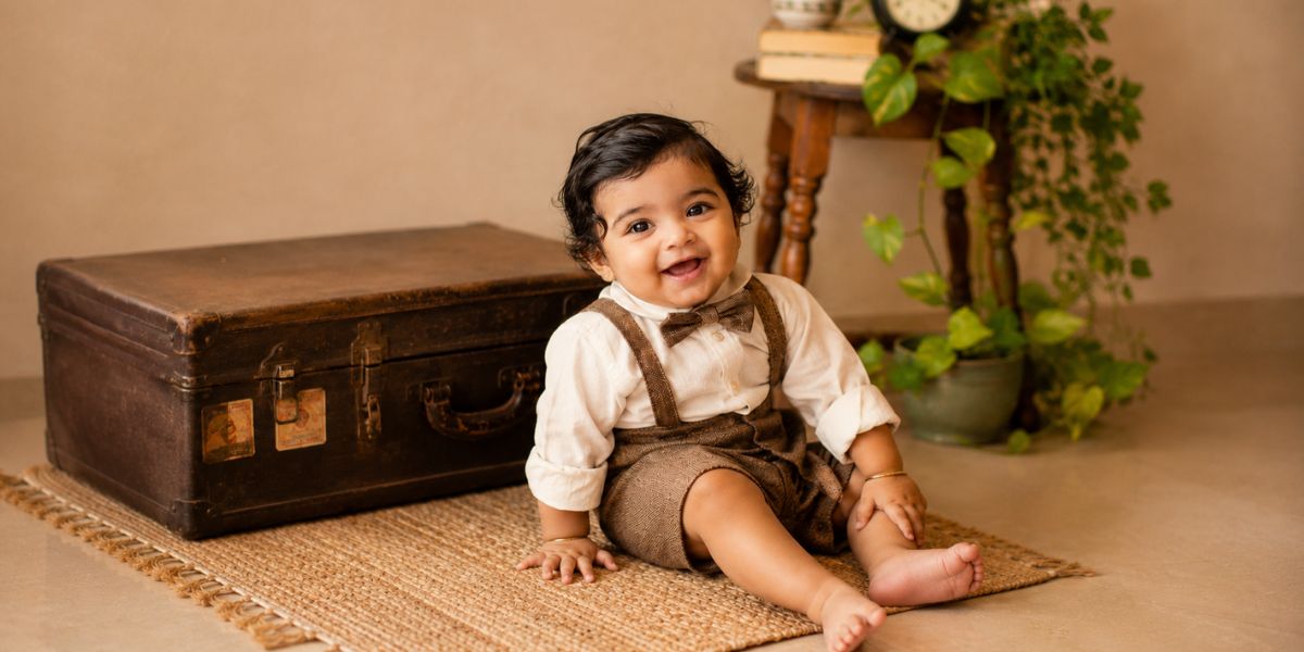 Vintage-inspired 6 month baby photoshoot with classic props