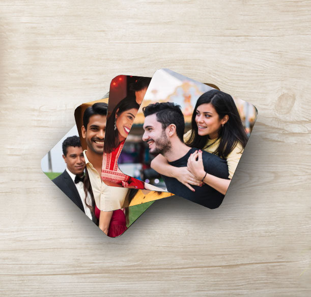 Overlapping personalised photo magnets featuring couple and family photographs